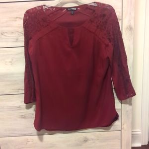 Burgundy half sleeve top with floral sleeves from Express